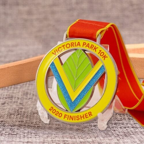 Hollow soft enamel commemorative medal with red and yellow mixed color ribbon